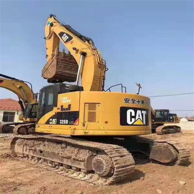 34.7 طن جاهز للعمل وذو خبرة في استخدام اليابان كاتربيلر 328 دي في حالة جيدة