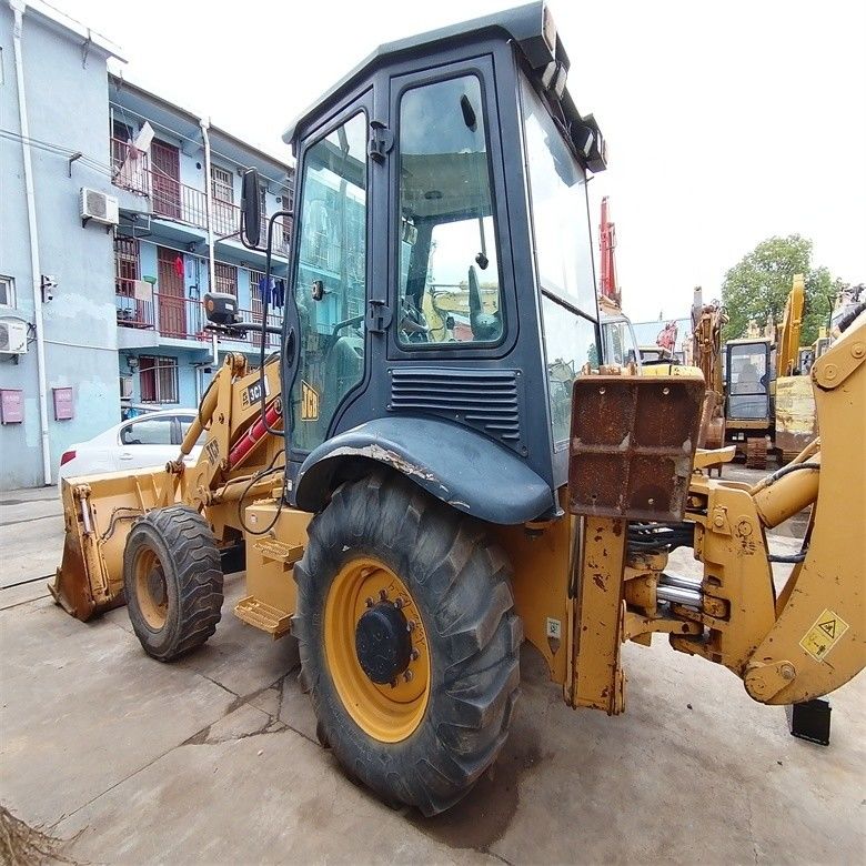 مضخة هيدروليكية أصلية مستعملة JCB 3CX محمول الحفر الخلفي 6.07 طن الحمولة الاسمية في حالة جيدة